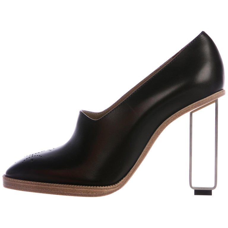 hermes black heels