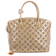 Louis Vuitton Fascination Lockit Frame Handbag Patent Lambskin BB at 1stDibs