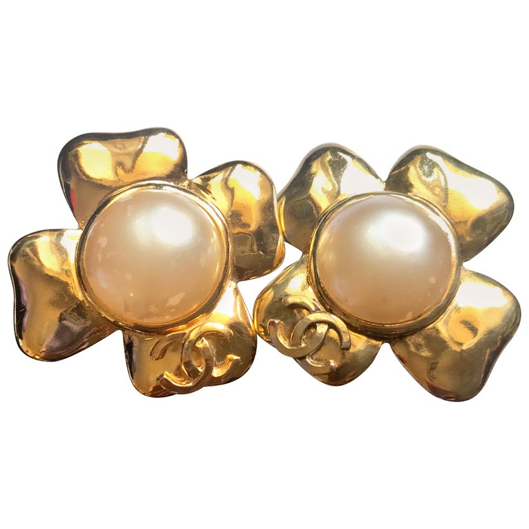 Chanel Vintage large golden camellia flower earrings with faux pearl and CC  mark For Sale at 1stDibs