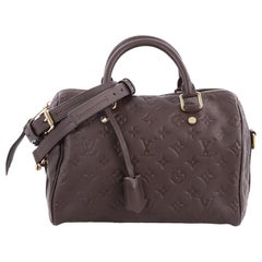 Louis Vuitton Speedy Bandouliere Tasche mit Monogramm aus Empreinte Leder 30