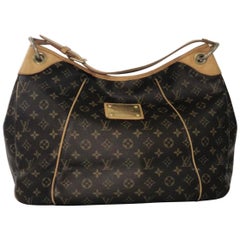 Sold at Auction: LOUIS VUITTON pouch bag PETIT NOÉ, coll.: 2008.