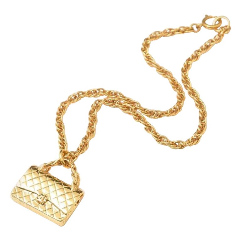 Vintage CHANEL golden chain necklace with classic 2.55 bag charm. For Sale