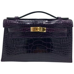 Hermes Aubergine Mini Kelly Pochette in shiny crocodile