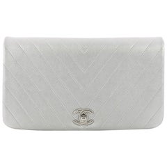 Chanel CC Flap Clutch Chevron Calfskin Medium