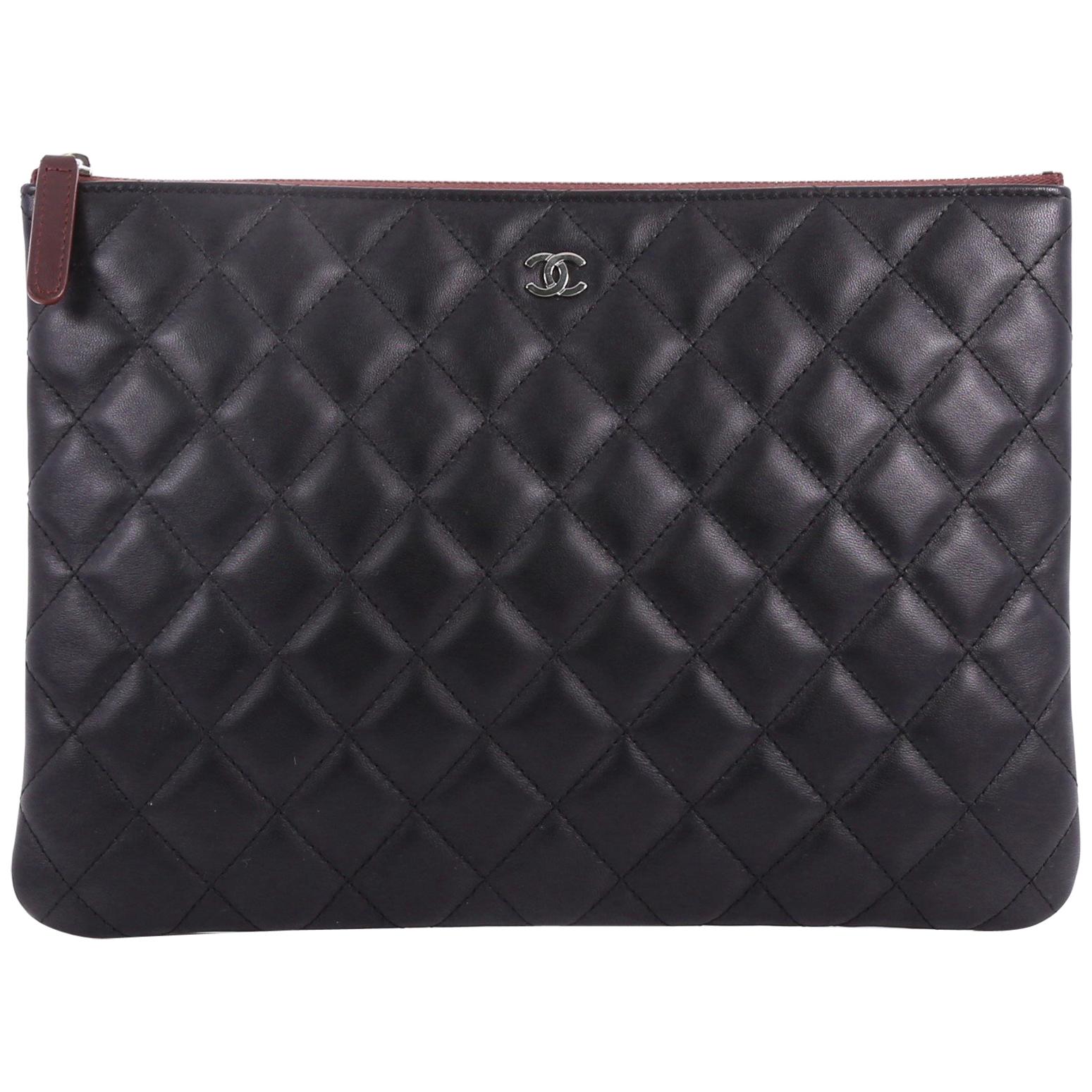 Chanel O Case Clutch Quilted Lambskin Medium 