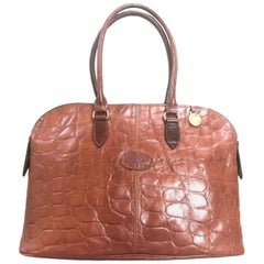 Used Mulberry croc embossed brown leather bolide tote bag. By Roger Saul.