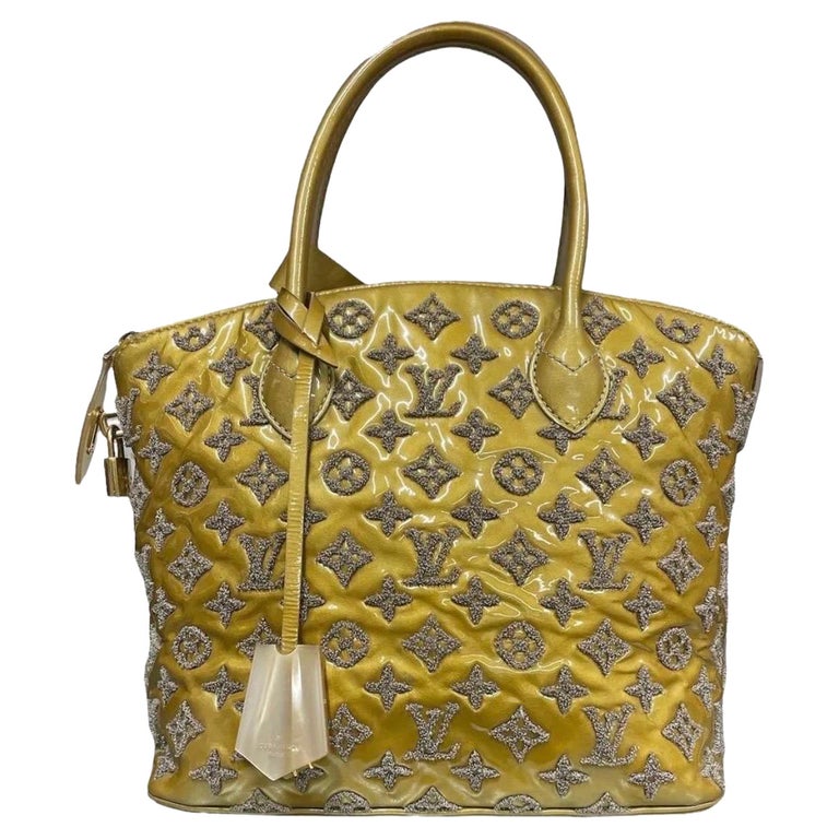 2011 Louis Vuitton Lockit Gris Limited Edition For Sale at 1stDibs
