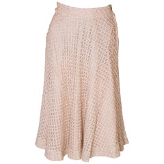 A vintage 1950s cream ribbon woven swing skirt