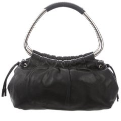 prada metal handle bag