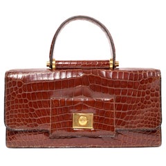 1940's HERMES crocodile top handle bag with geometric hardware