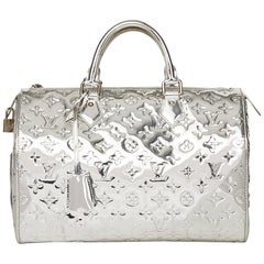 A LIMITED EDITION SILVER MONOGRAM MIROIR SPEEDY 30 WITH SILVER HARDWARE,  LOUIS VUITTON, 2006