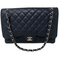 Chanel Timeless Classic Maxi Single Flap Bag in Black Caviar with Silver  Hardware - SOLD