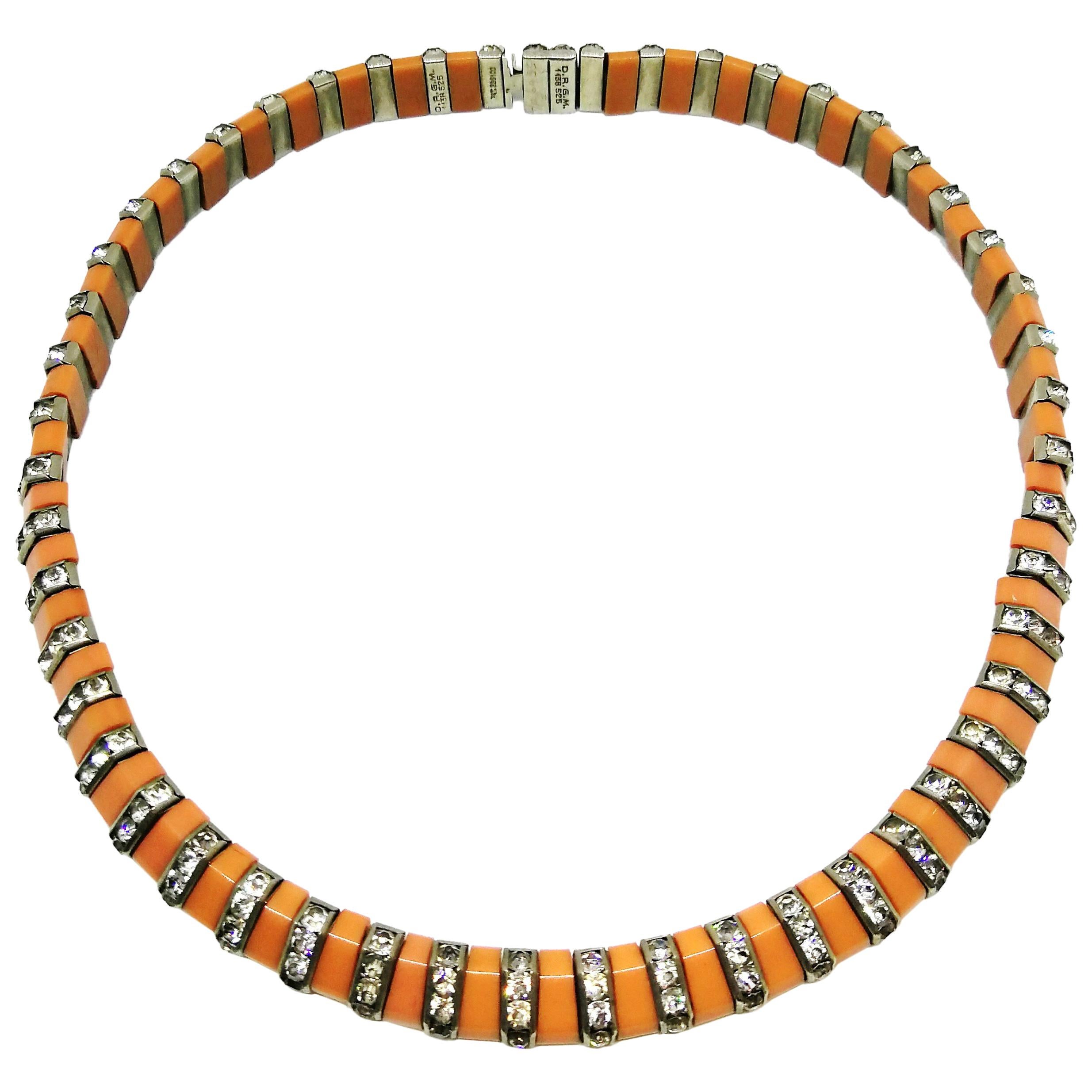 D.R.G.M soft salmon pink Bakelite and paste necklace, Germany 1930s