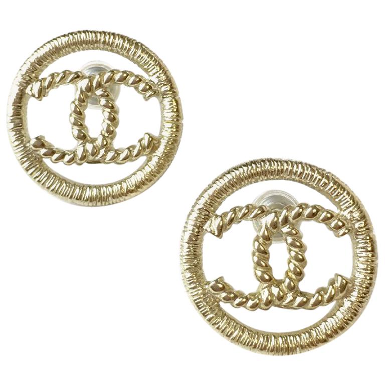 CHANEL CC Stud Earrings in Gilt Metal