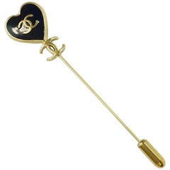 CHANEL Pin Brooch in Gilt metal with a Black Enamelled Heart