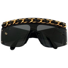 Retro CHANEL 80's Collector Sunglasses in Black Plexi, Gilt Metal Chain and Leather