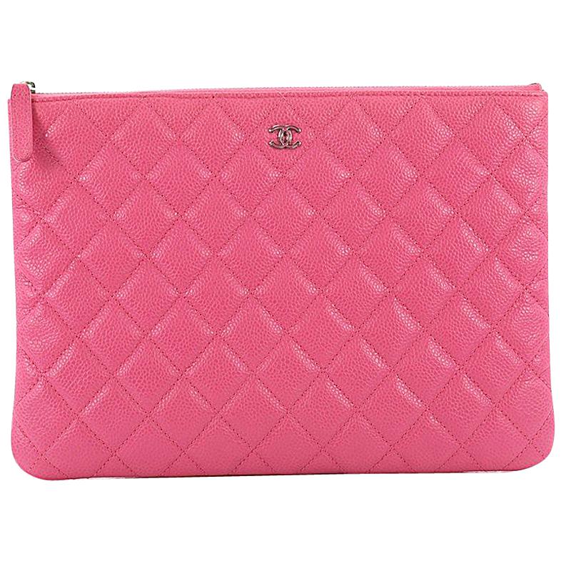 Chanel O Case Clutch Quilted Caviar Medium