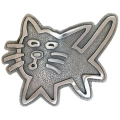 George Silversmith is From Wide Ruins, kitty pendant Melanie Yazzie Navajo