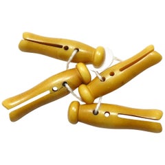 Four (4) Vintage Art Deco Butterscotch Bakelite Clothespins