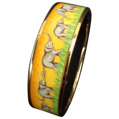 Hermès Enamel Printed Bracelet Elephants Grazing Gold Hdw Yellow Size GM 70