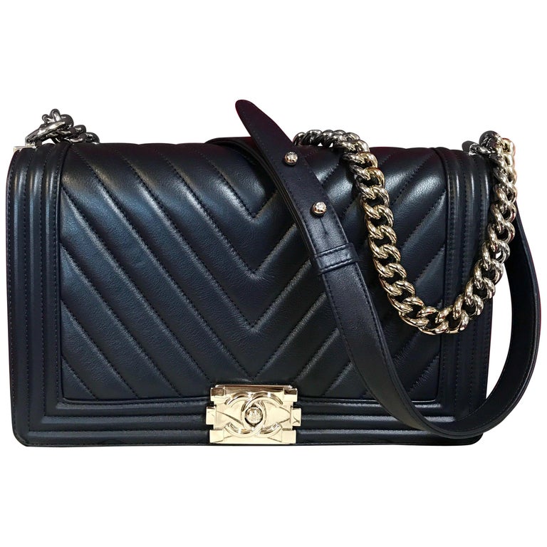Handbags Chanel Chanel Black Quilted Lambskin New Medium Boy Flap Bag with Gold HARDWARE.
