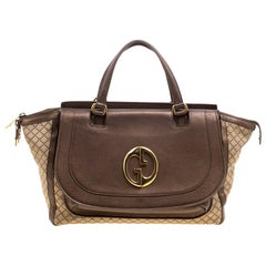 Gucci Beige/Metallic Dark Beige Canvas and Leather Medium 1973 Top Handle Bag