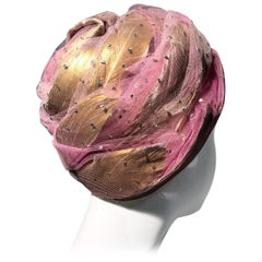 1960s Christian Dior Beeehive Turban Style Hat In Pink Tulle & Gold Feathers