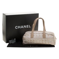 Chanel Beige Canvas Travel Ligne Baguette Bag