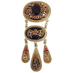 Edwardian Floral Dangling Brooch with Red Crystals and Black Enamel in Brass