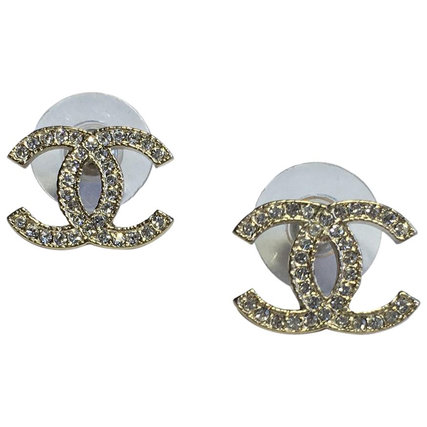 CHANEL CC Stud Earrings in Pale Gilt Metal Set with Rhinestones