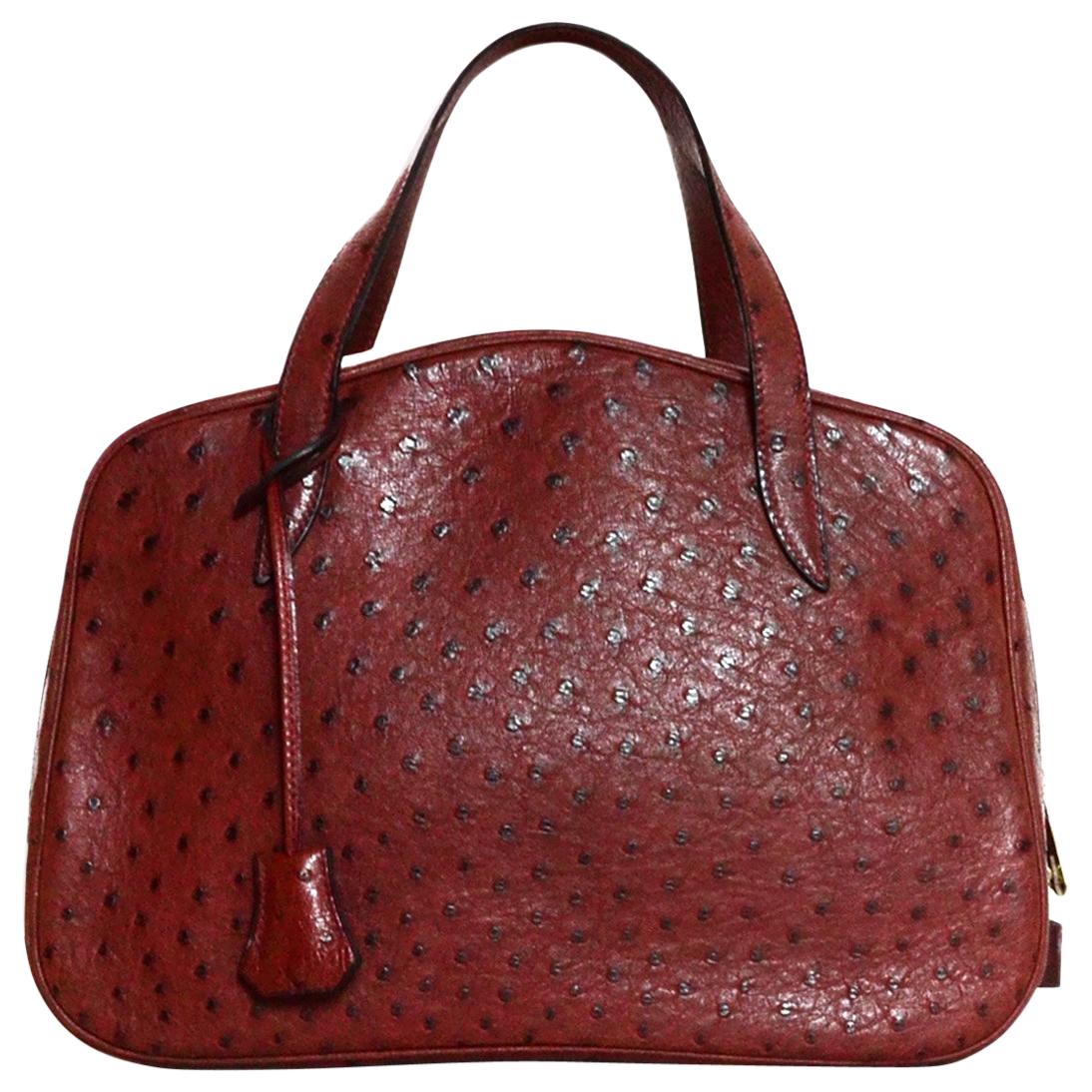 Hermes NEW Limited Edition Maroon Ostrich Doha Bag w/ Dust Bag, Lock & Key