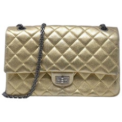 Chanel 2.55 Reissue Jumbo Double Flap Chevron Gold Leather Handbag