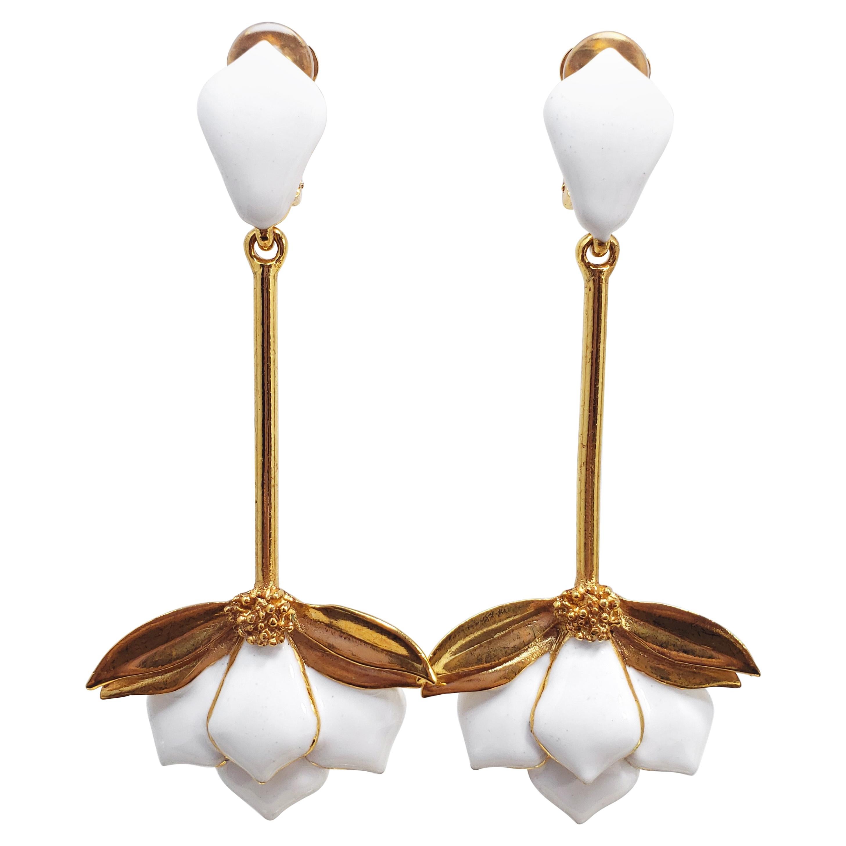 Oscar de la Renta Long Dangling White Enamel Golden Flower Fashion Drop Earrings