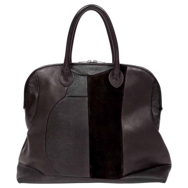 CELINE by PHOEBE PHILO black Leather Patchwork Bowling Duffle Bag For Sale at 1stDibs