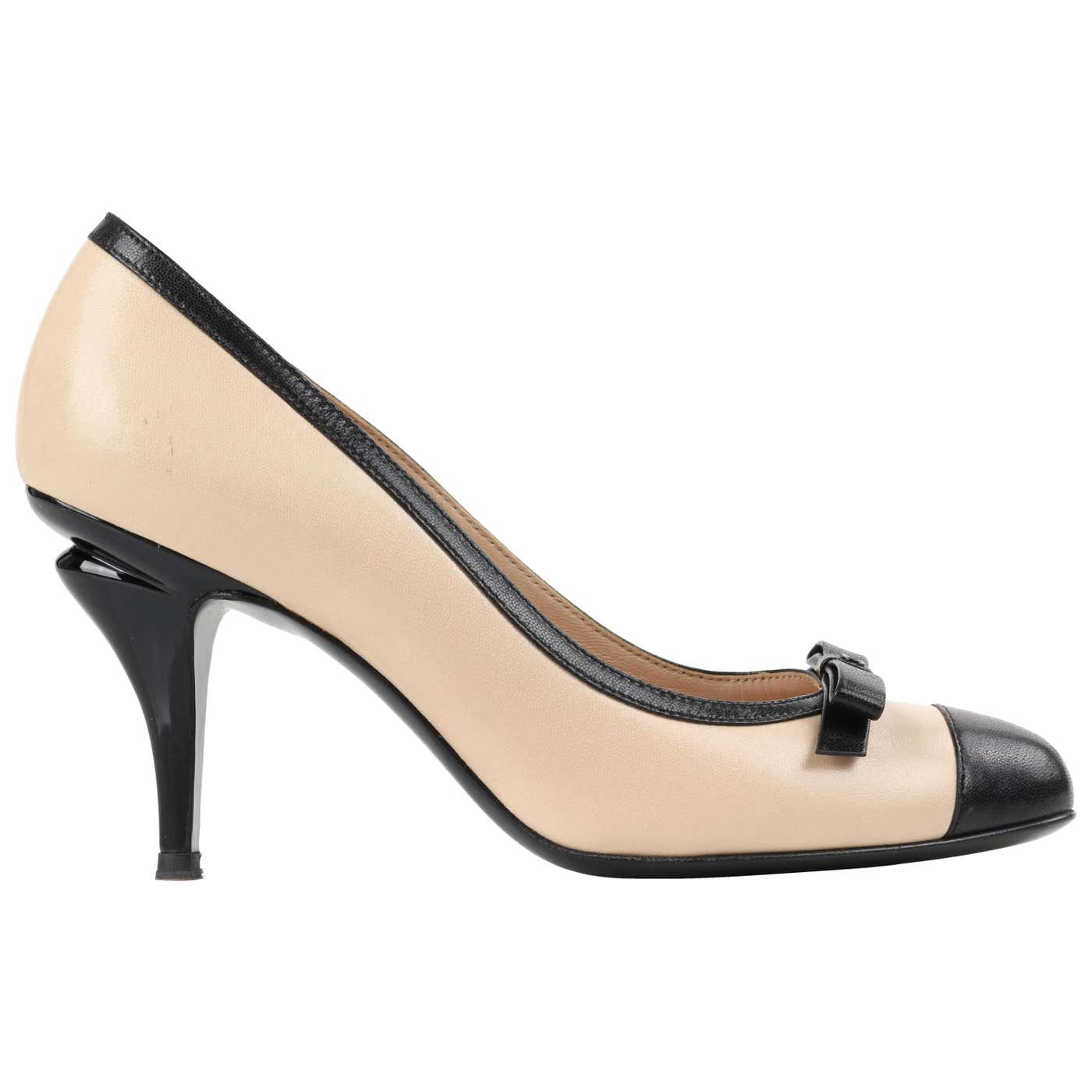 CHANEL Nude and Black Leather Classic Bow Cap Toe Sculptural Heel Pumps ...