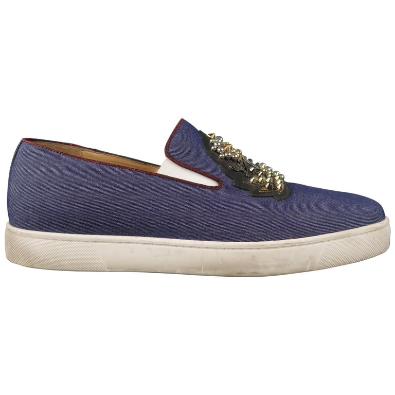 CHRISTIAN 10.5 Indigo Denim Leather Studded Patch Slip On Sneakers For Sale at 1stDibs