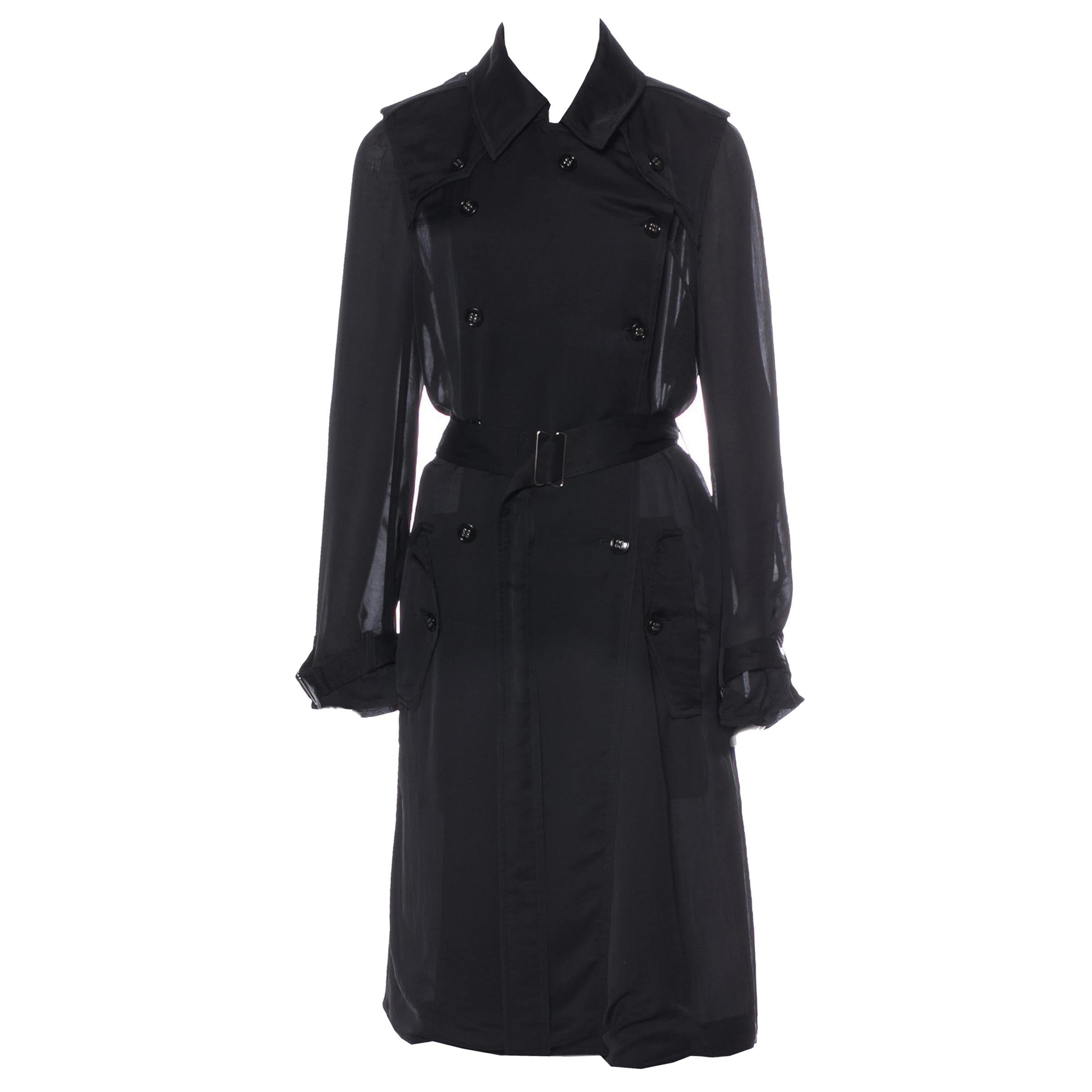 Yves Saint Laurent
Size: S/M  US4, FR38
Brand New with Tags $2295

Butter Soft Sheer Silken Trench Coat
Spring/Summer 2009 Runway Collection
Amazing attention to detail
Lightweight double-breasted  
Pointed collar
Dual shoulder epaulets
Dual slit