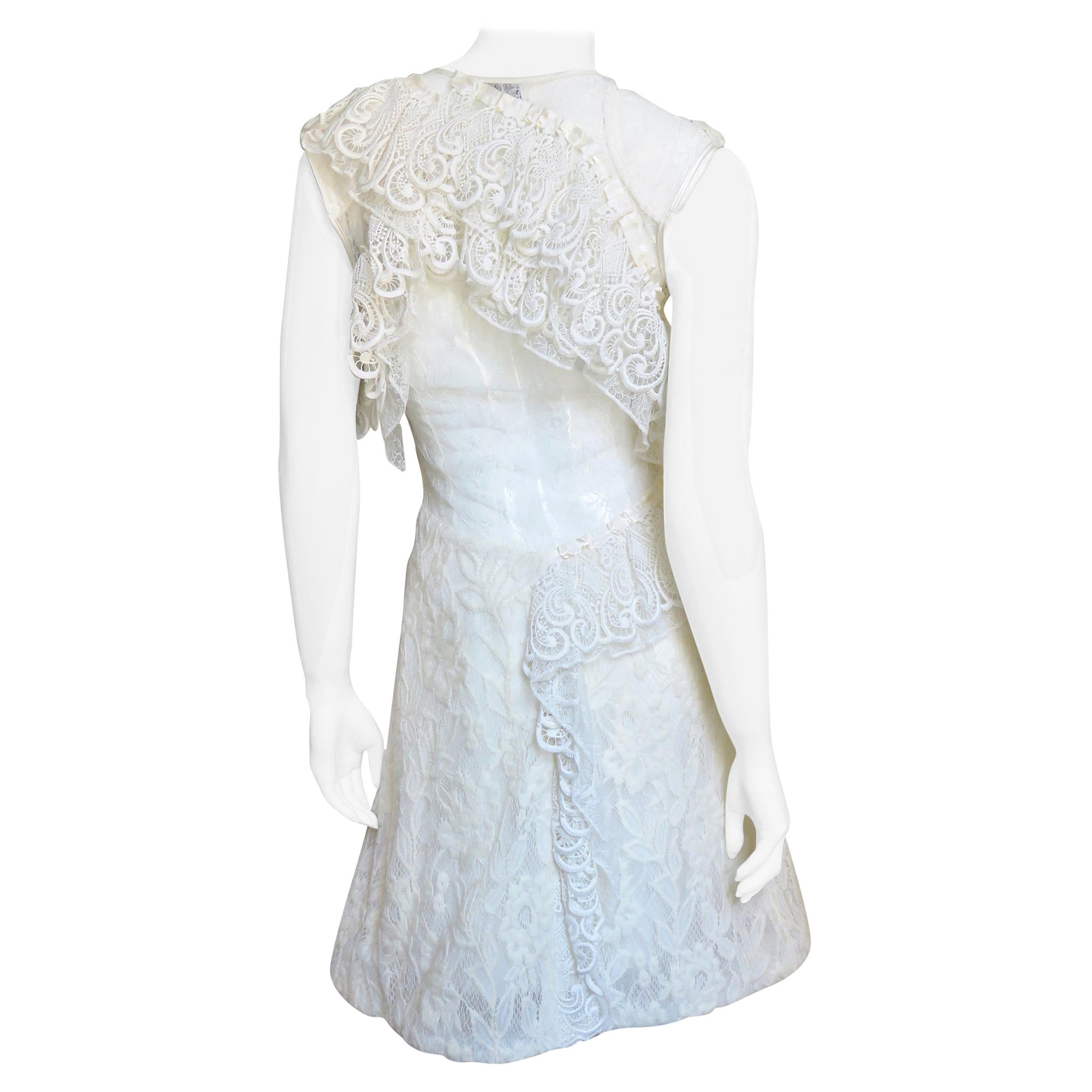 Nina Ricci Lace Dress with Cut out Back For Sale
