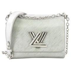 Louis Vuitton Twist Handbag Epi Leather PM