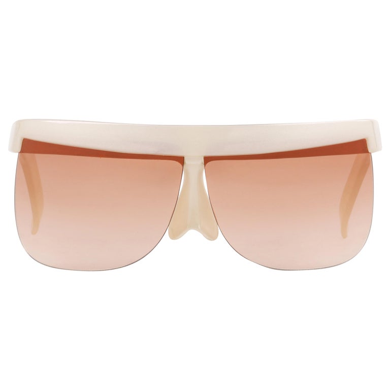 COURREGES c.1970's Off White Plastic Half Frame Futuristic Sunglasses 7853  at 1stDibs | white plastic sunglasses, courreges sunglasses, futuristic glasses  frames