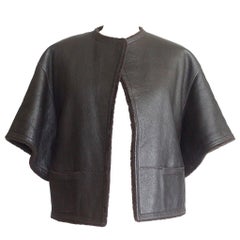 Hermès - Veste cape en peau de mouton marron foncé à manches 3/4, taille 38/4 à 6  Remarquable 