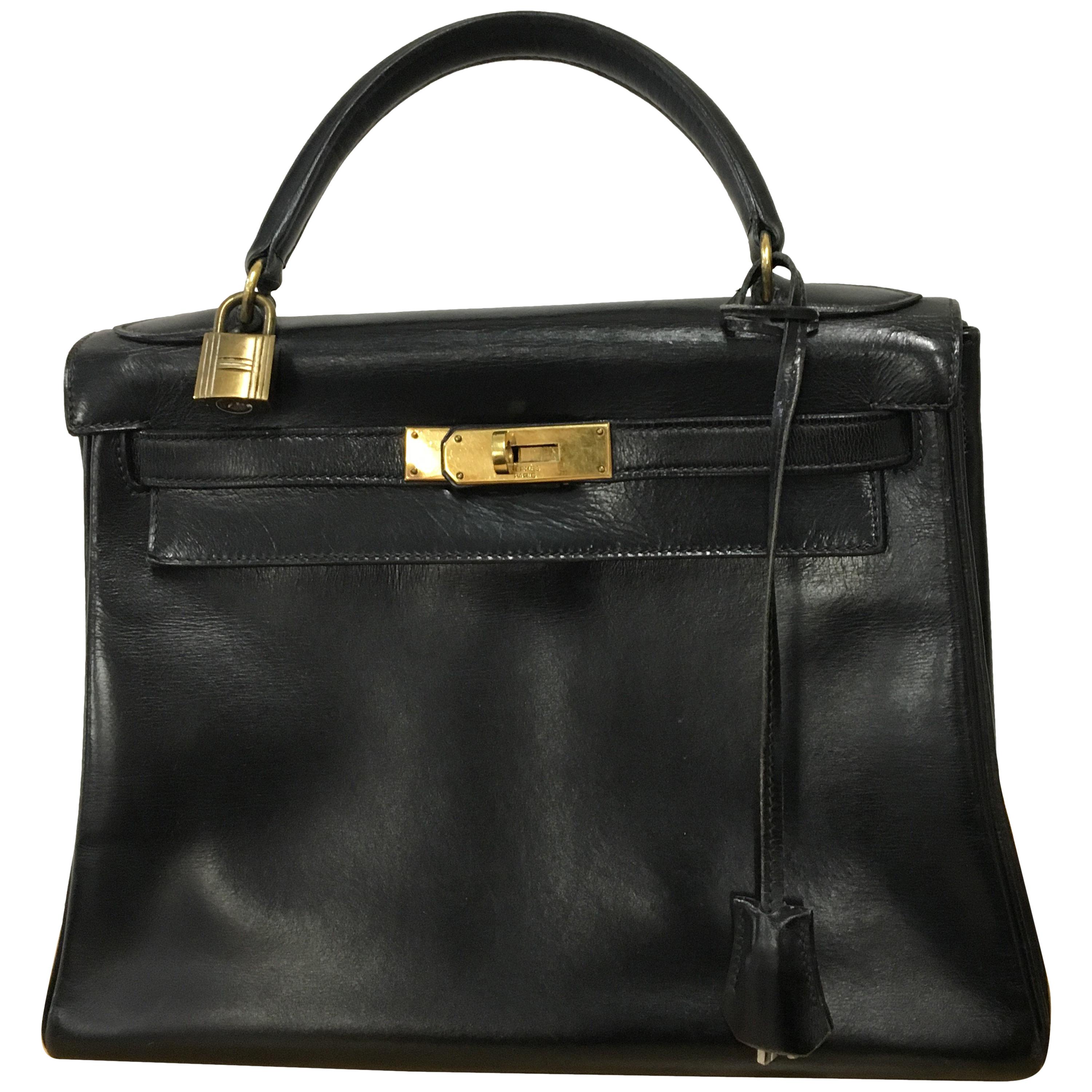 Hermès vintage 1950's black leather Kelly bag. For Sale at 1stDibs