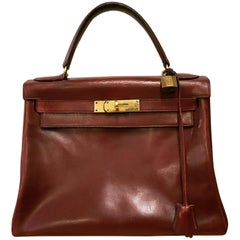 Hermès vintage 1950's marron/ burgundy leather Kelly bag.