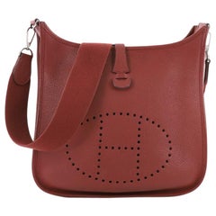 Hermes Evelyne I PM, crafted in Sienne red Clemence leather