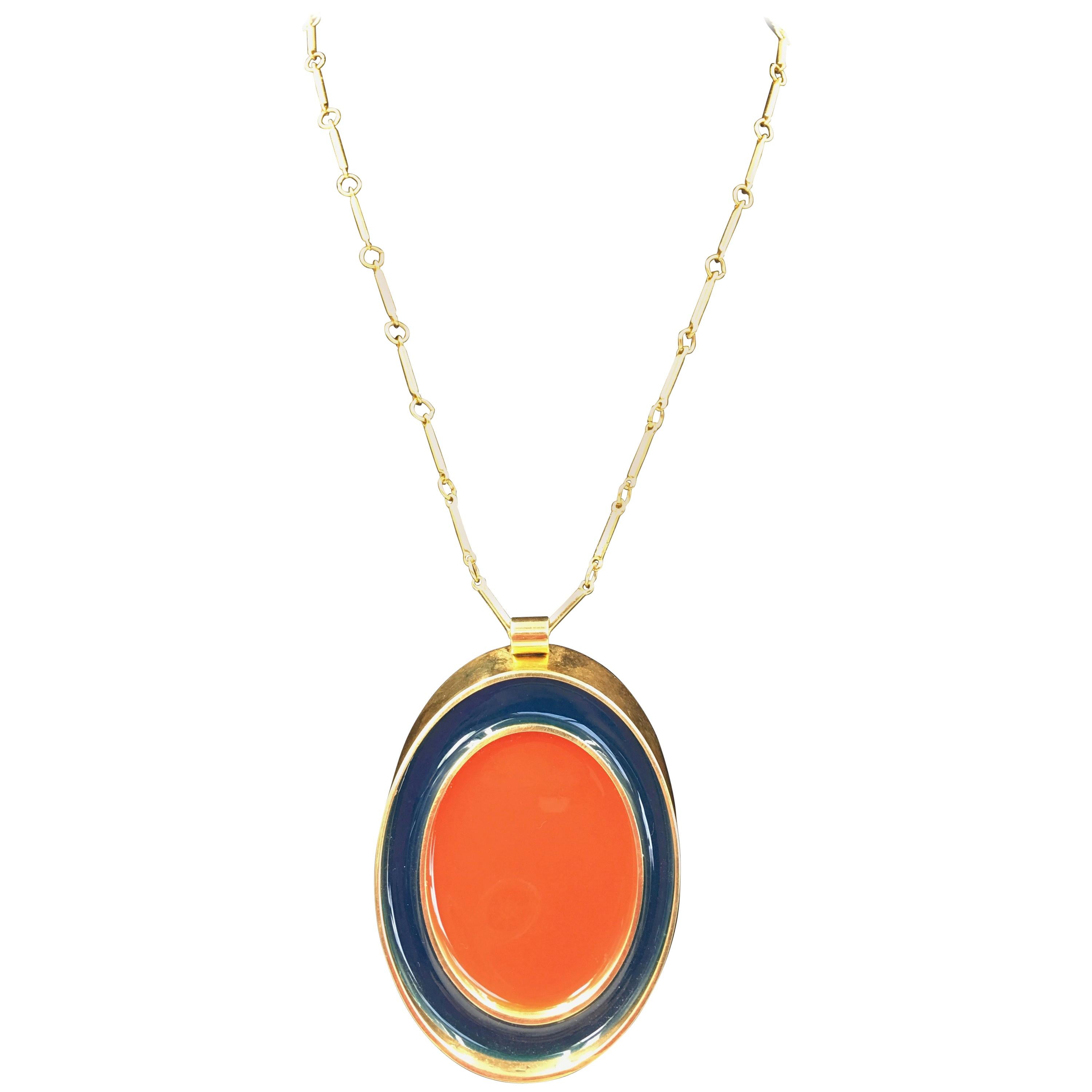 Guy Laroche Gold Tone Necklace with Red + Navy Enamel Plated Oval Pendant For Sale