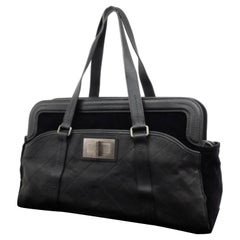 Chanel Duffle Bag - 25 For Sale on 1stDibs  chanel travel duffle bag, chanel  quilted duffle bag, chanel duffle bag black