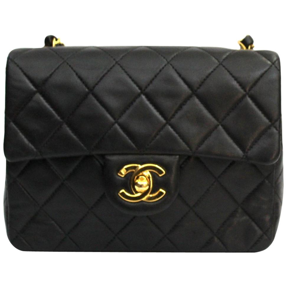 90s Chanel Black Leather Mini Flap Bag at 1stDibs