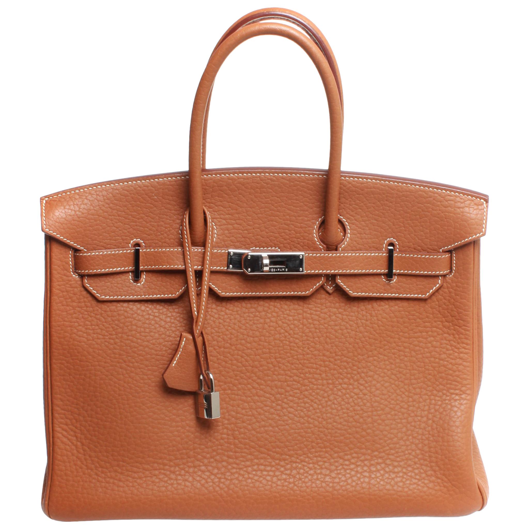 35 Hermes Birkin, brown with dust cover and silver hardware stamped K 