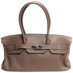 Large brown JPG Hermes Handbag with silver hardware stamped M
