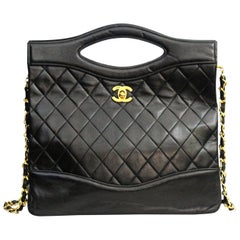 89-91 Chanel Black Leather Bag